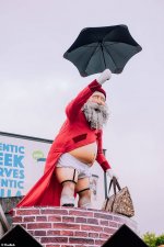 6778226-6440629-A_cross_dressing_Santa_clad_in_Mary_Poppins_style_clothing_has_b-a-7_154346424...jpg